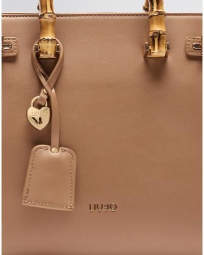 BORSA CON DUE MANICI IN LEGNO E TRACOLLA